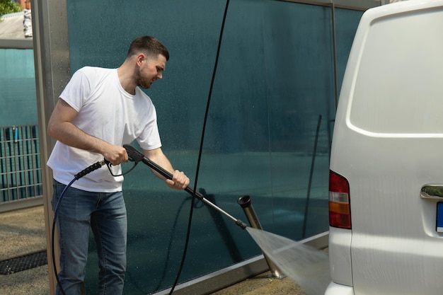 man washes car selfservice car wash 185193 129700